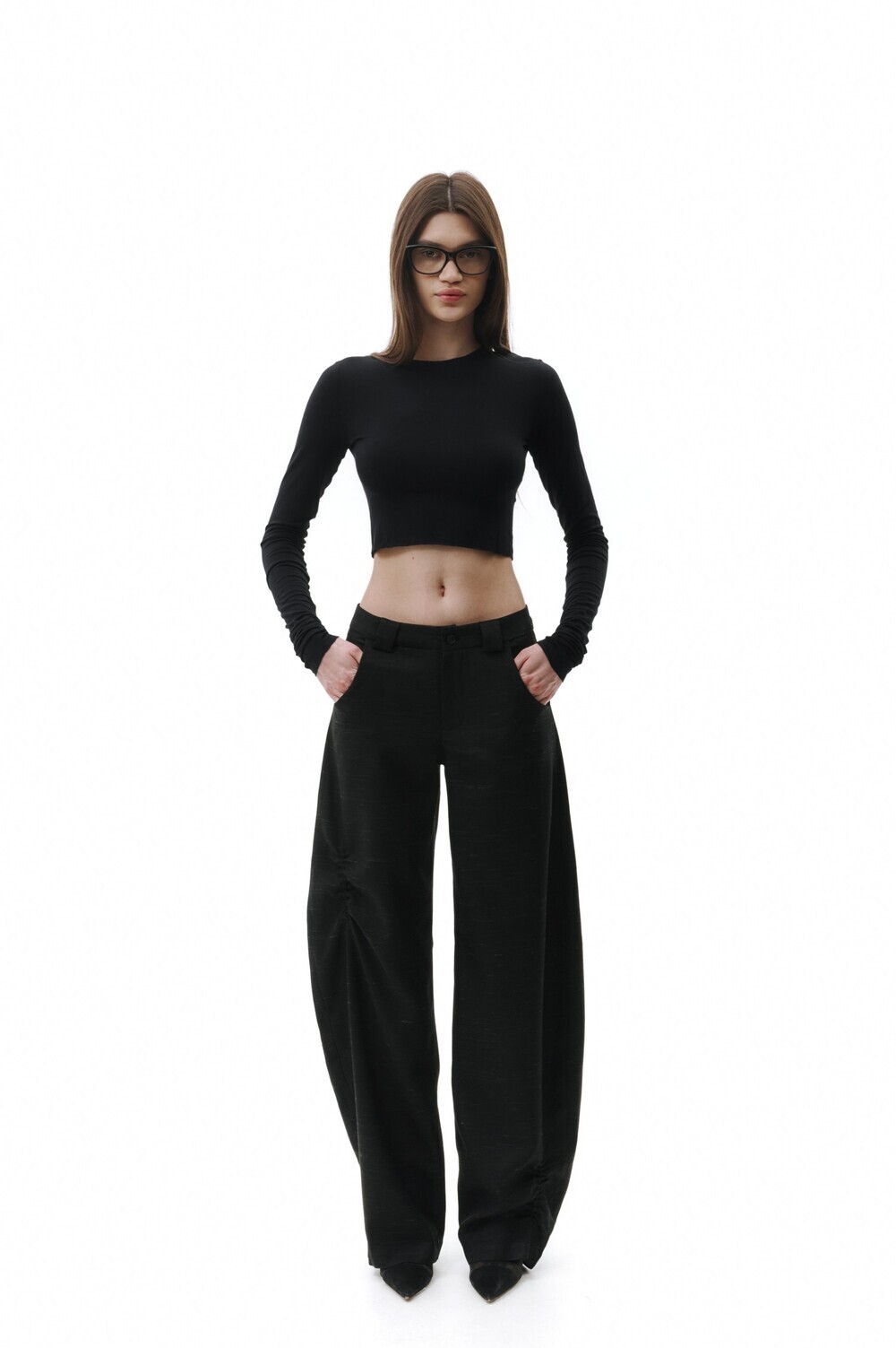 Black trousers with pintucks